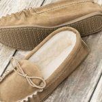 Beige British Made Suede Moccasin Slippers on wood