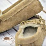 Beige British Made Suede Moccasin Slippers on white floor boards