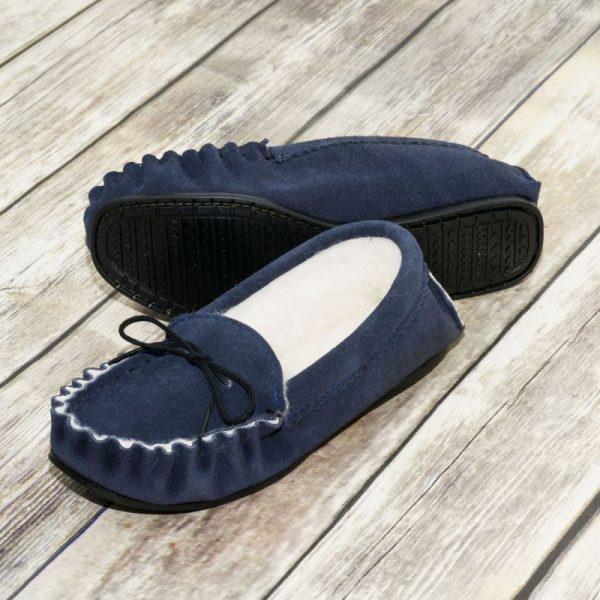 Navy British Made Suede Moccasin Slippers on wooden floor