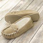 Beige British Made Suede Moccasin Slippers on wooden background