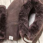 British made mocha house boots on a wooden background, inside view